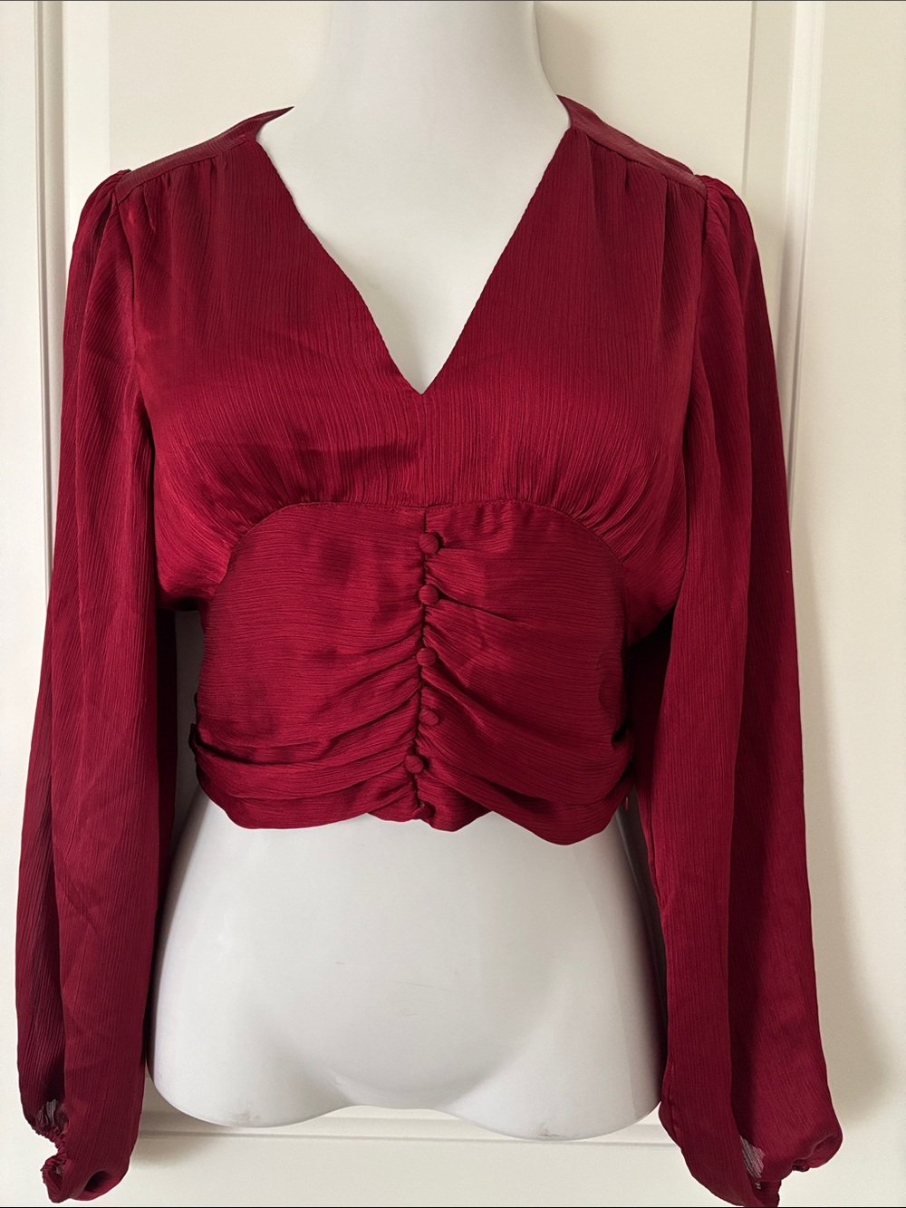 bebe Burgundy Ruched V-Neck Long Sleeve Crop Top